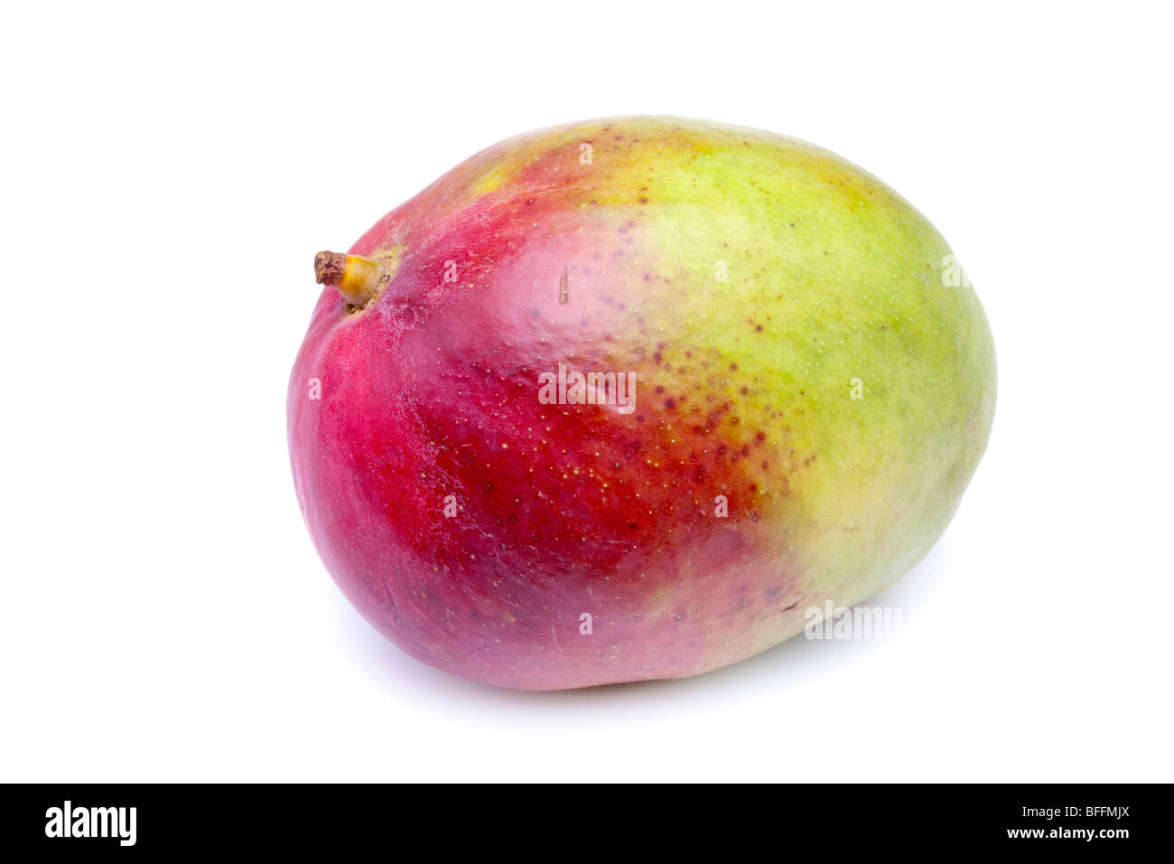 saftige Mango-Frucht auf weißen Hintergrund isoliert. Stockfoto