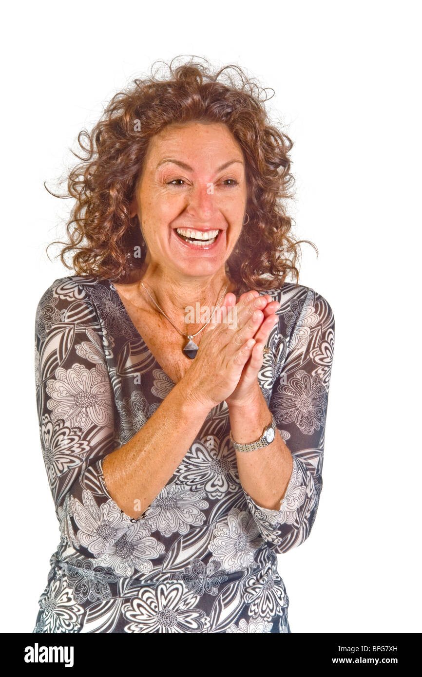 Die Geste des reibt ihre Hände zeigt Erwartung in dieser Frau Körpersprache gesehen. Stockfoto