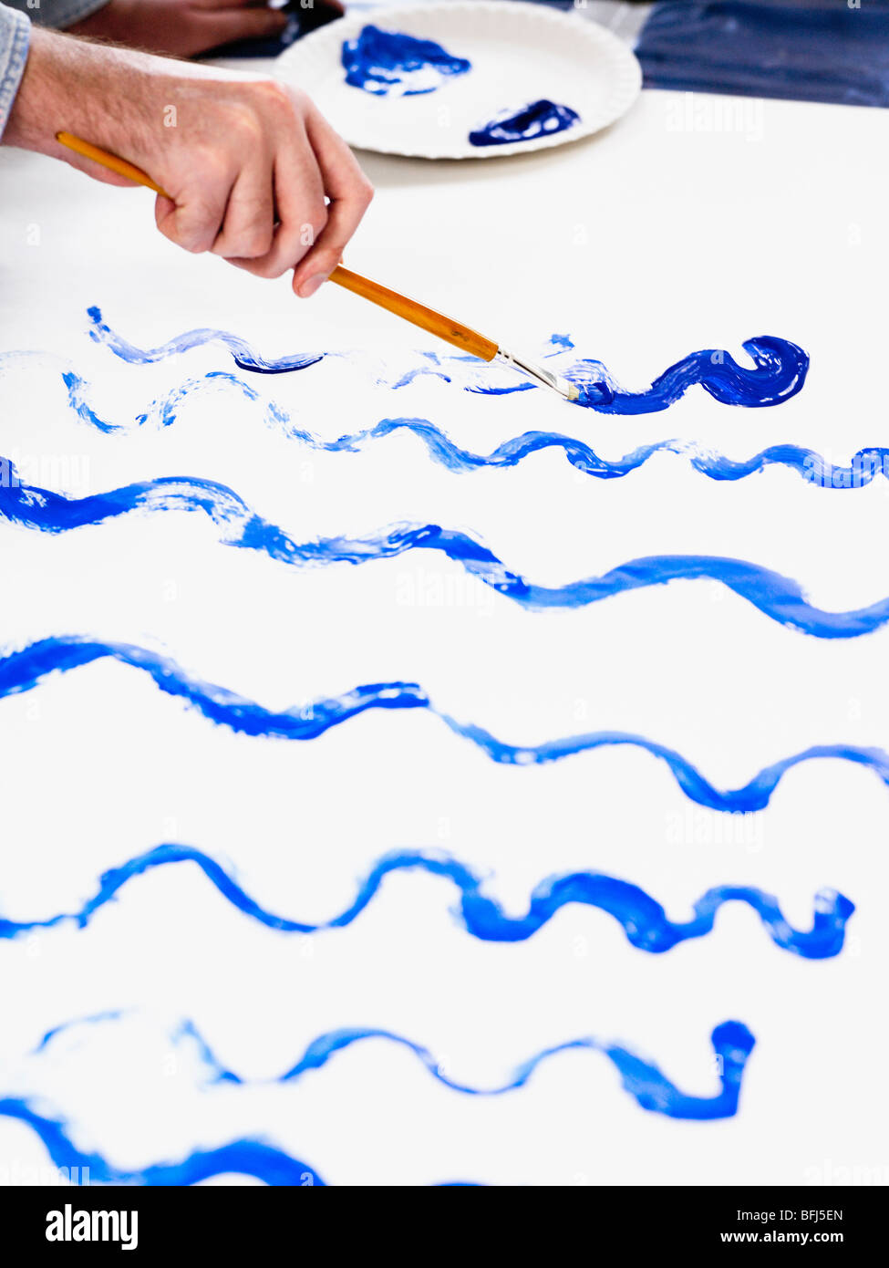 Blaues Muster malen. Stockfoto