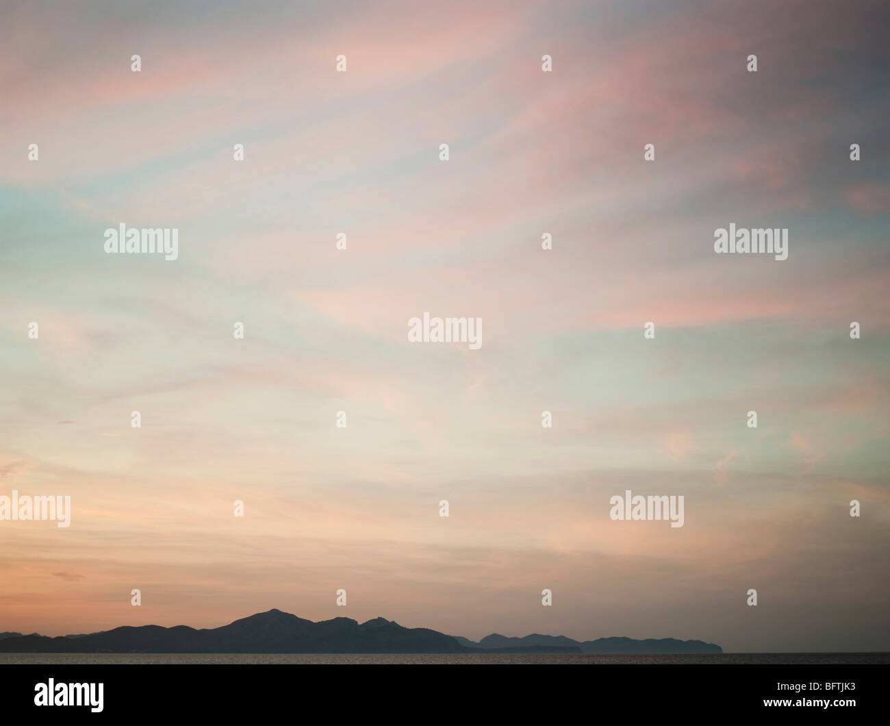 Sonnenuntergang am Strand Stockfoto