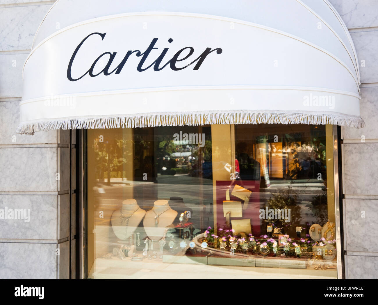 Luxusmarke Cartier beworben auf Shop in Marbella, Costa Del Sol, Spanien Stockfoto