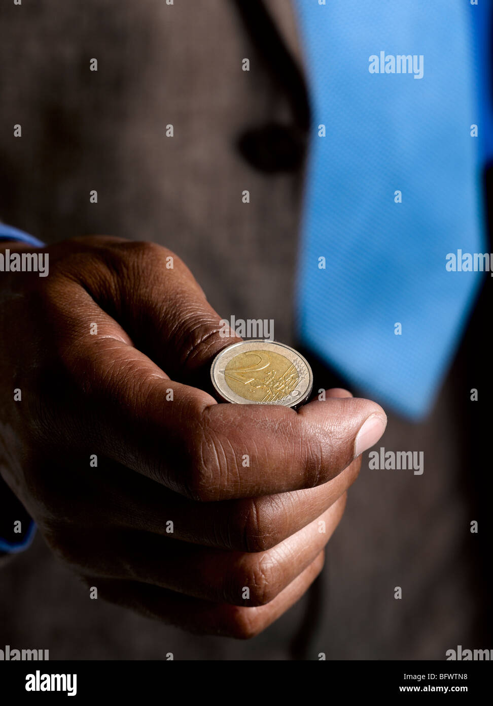 Business-Mann bereit, Euro Münze Stockfoto