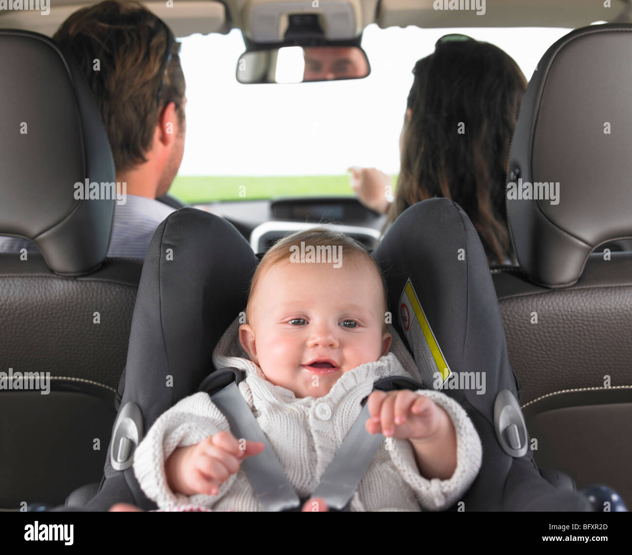 Baby im Autositz Stockfoto