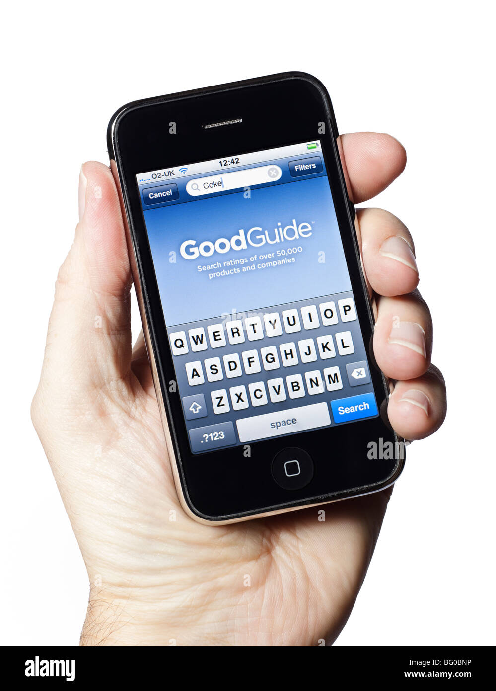 Männliche Hand, die iPhone Anwendung GoodGuide grüne Lebensmittel Stockfoto