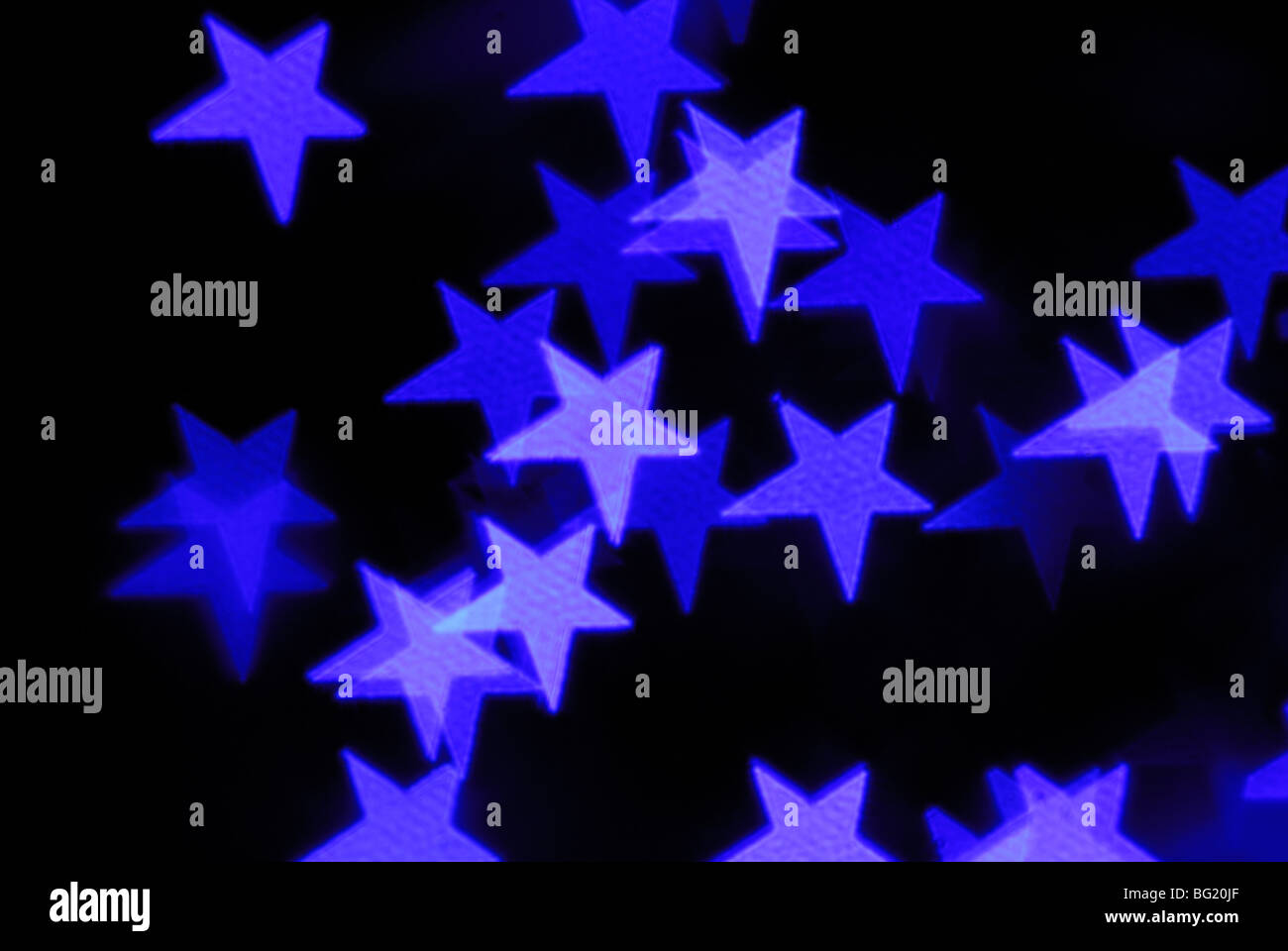 Abstrakte Sterne auf schwarzem Hintergrund Stockfoto