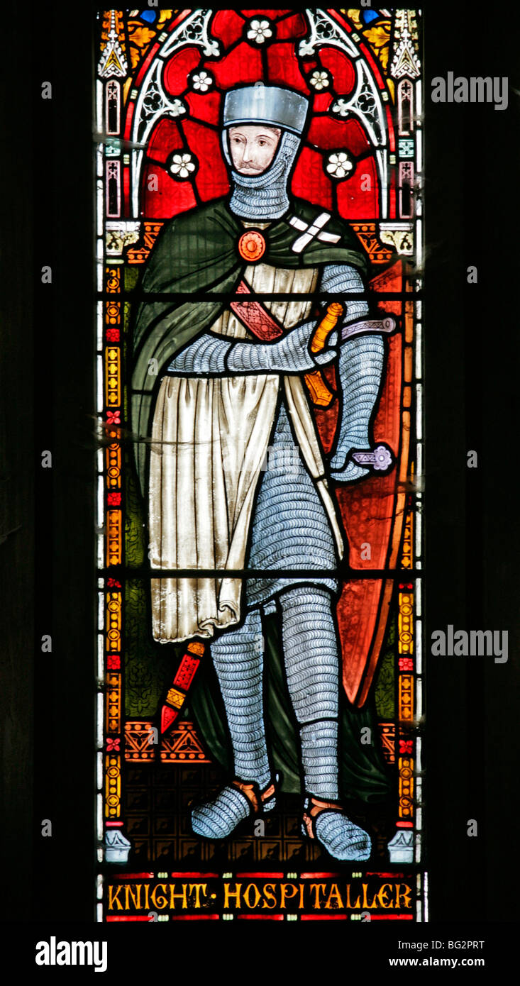 Detail aus dem Westen Glasfenster von Frederick Preedy Darstellung der Ritter Hospitalier, Kirche St. Andrew, Temple Grafton, Warwickshire Stockfoto