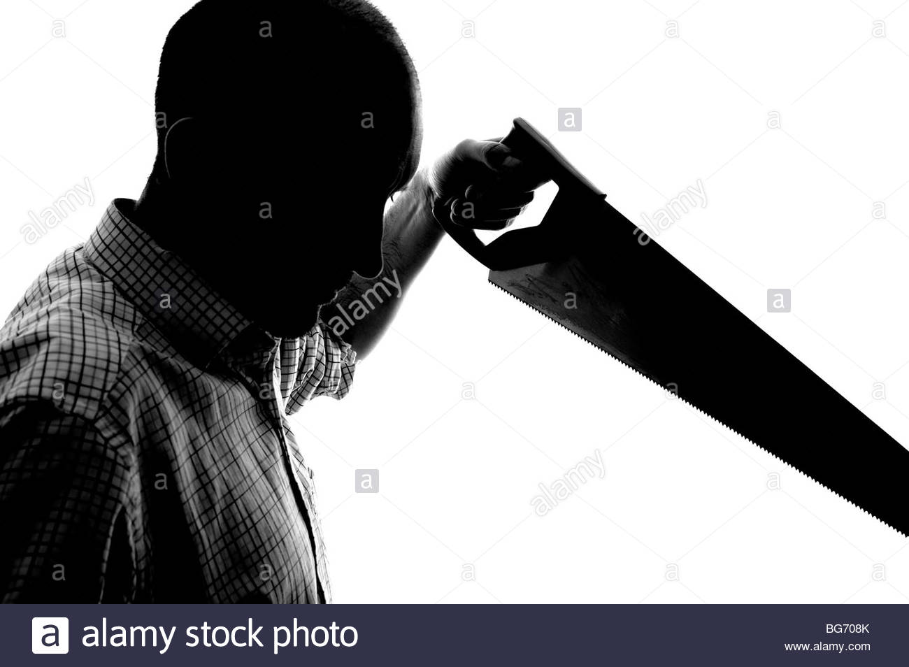 Silhouette Mann mit Säge Stockfoto