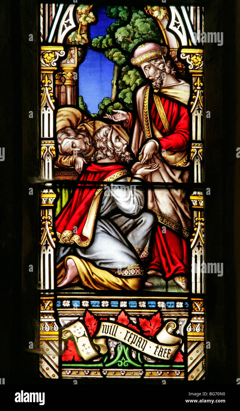 Ein Buntglasfenster von William Warrington, das den Barmherzigen Samariter, die St. Andrew's Church, Field Dalling und Norfolk darstellt Stockfoto