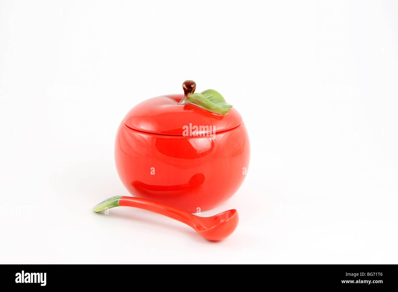 Jam Jar in Form von Apfel und Kelle Stockfoto