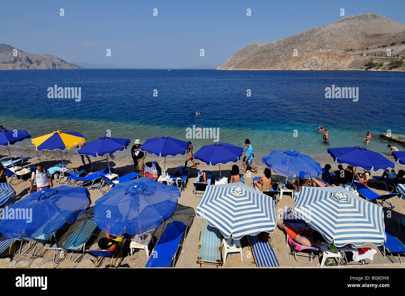 "NOS" Strand von Symi Stadt, Insel Symi, Griechenland Stockfoto