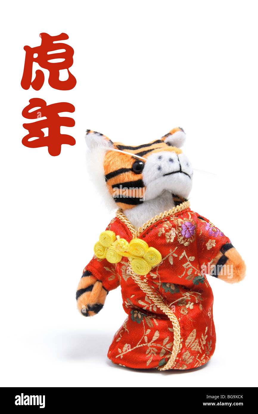 Spielzeug Tiger im chinesischen Kostüm Stockfoto
