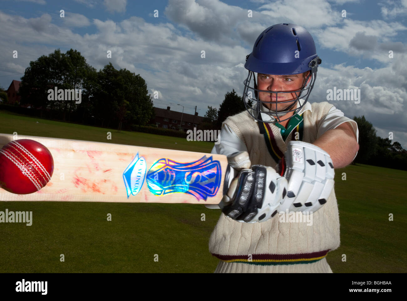 Kricketschläger Spieler Schlagmann Kugel Stockfoto