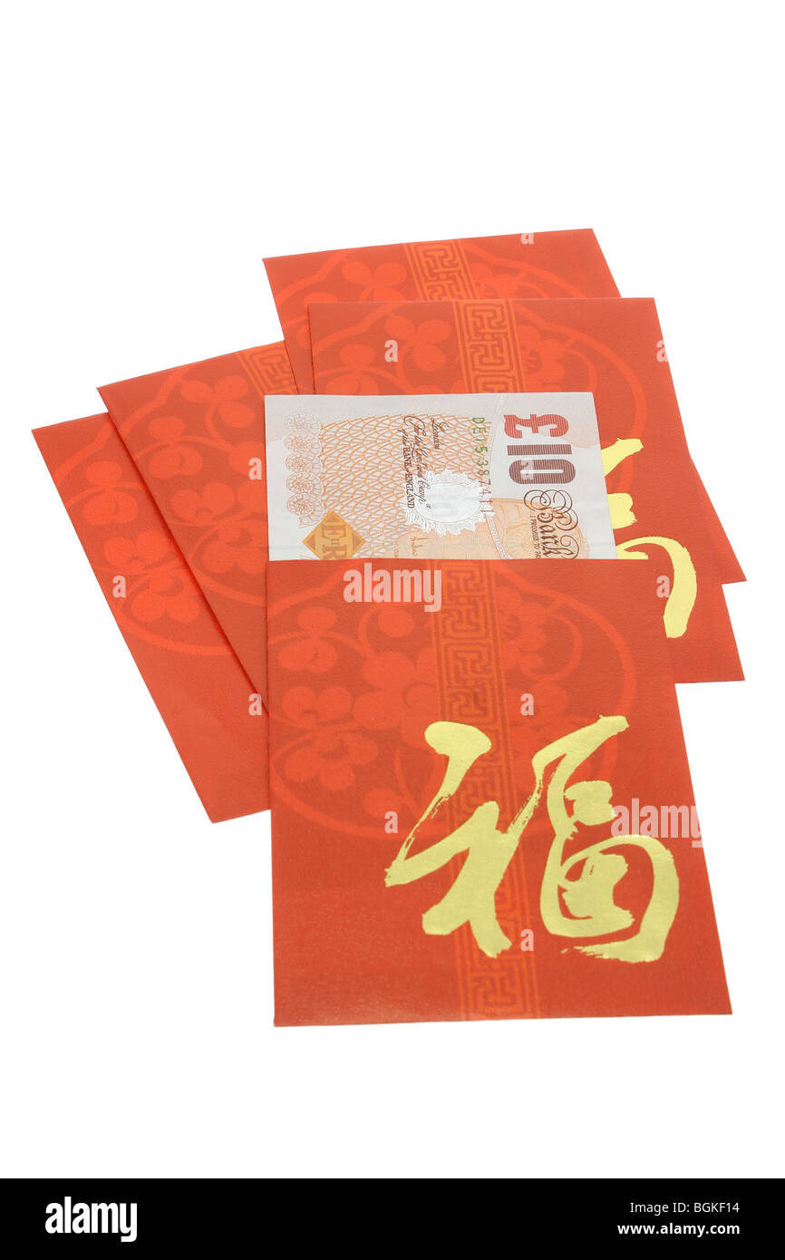 Chinese New Year rote Pakete und britische Banknoten auf weiß Stockfoto