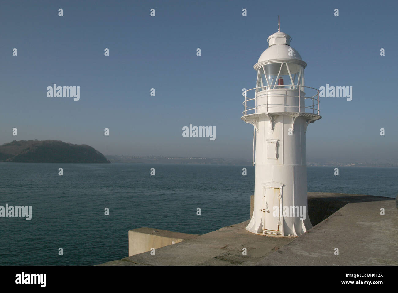 Brixham Leuchtturm auf der Hafen Ufermauer, Devon UK. Stockfoto