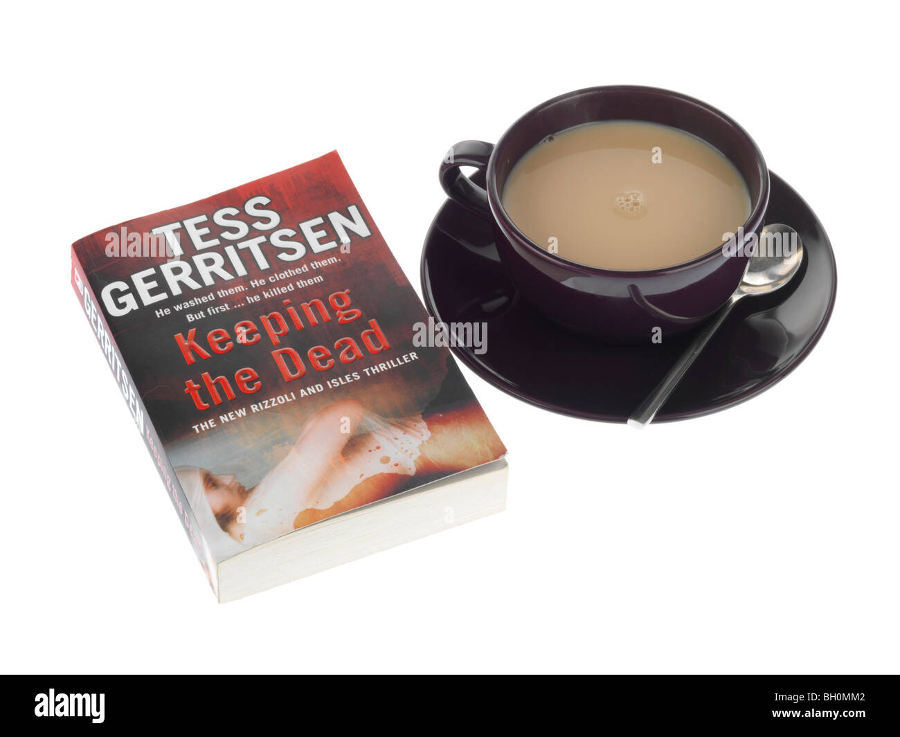 Tasse Tee mit einem Buch Stockfoto