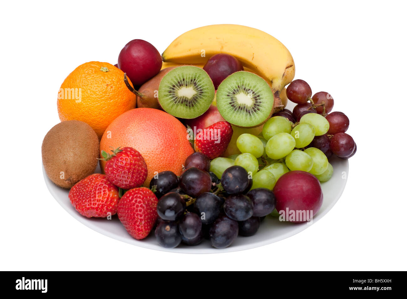 Foto von einem Obstteller, isoliert auf weiss. Ein Beschneidungspfad sorgt für einfache Extraktion. Stockfoto