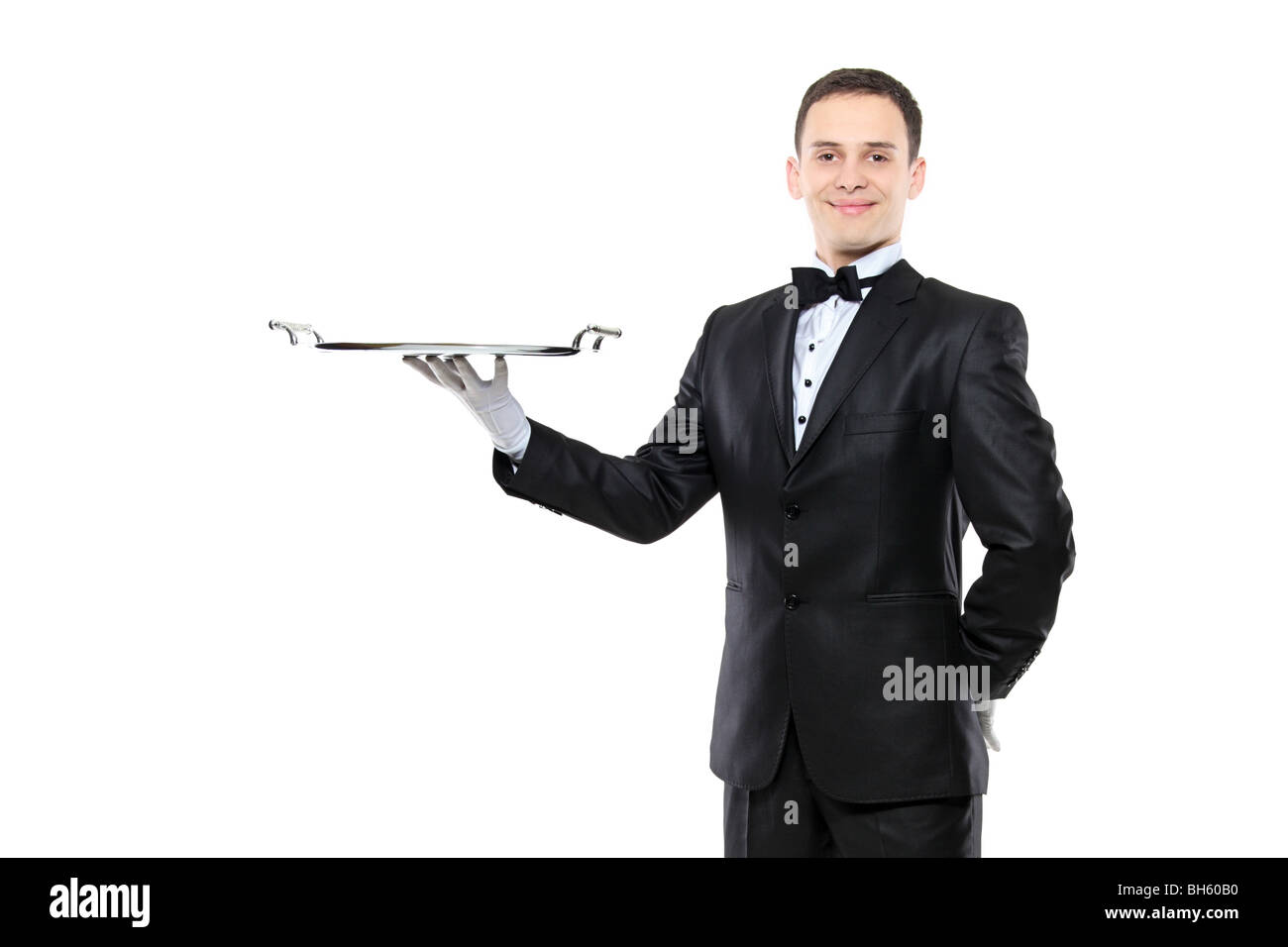 Butler hält eine leere Schale, isoliert auf weißem Hintergrund Stockfoto