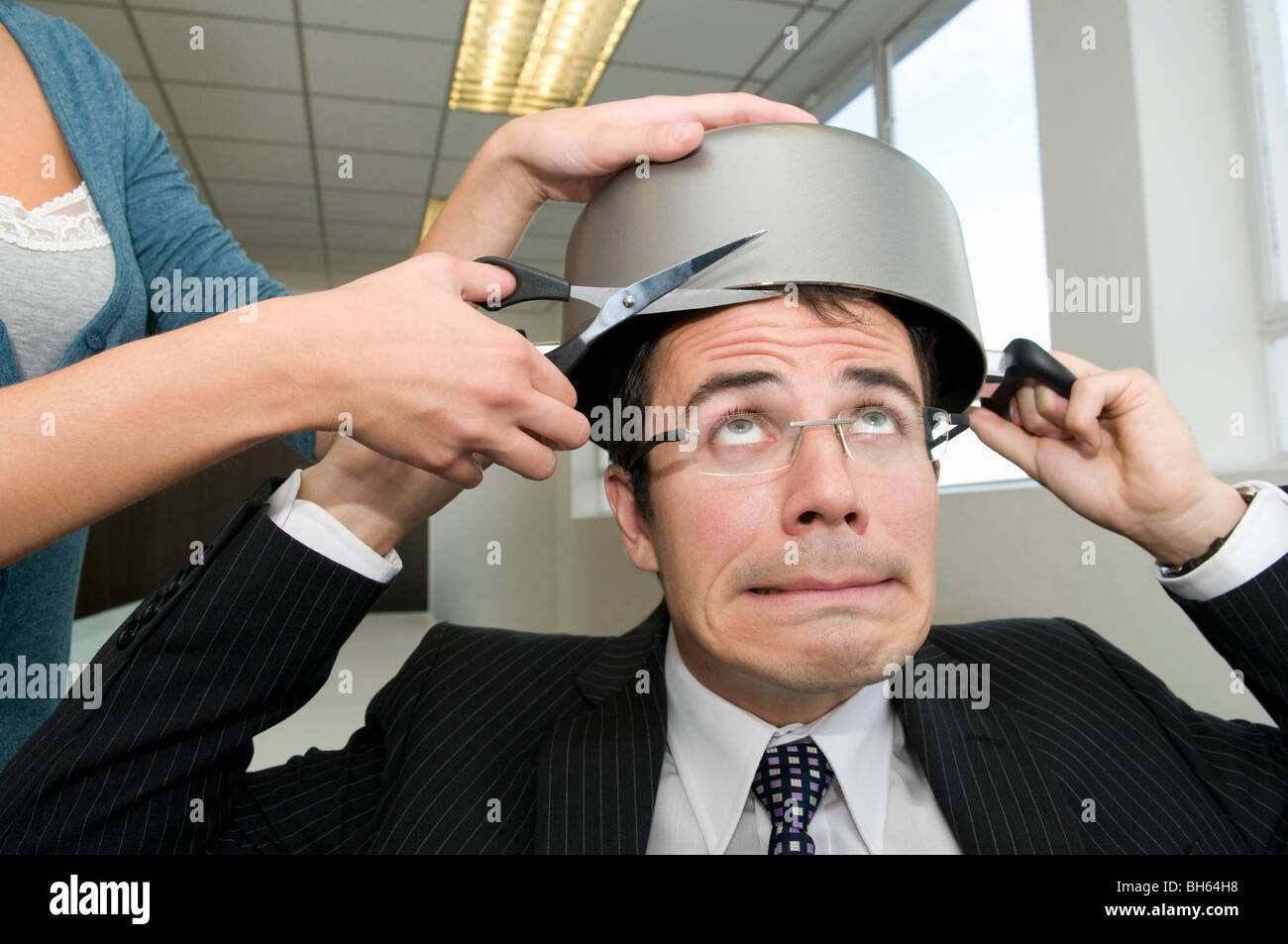 Geschäftsmann mit einem Haarschnitt Stockfoto