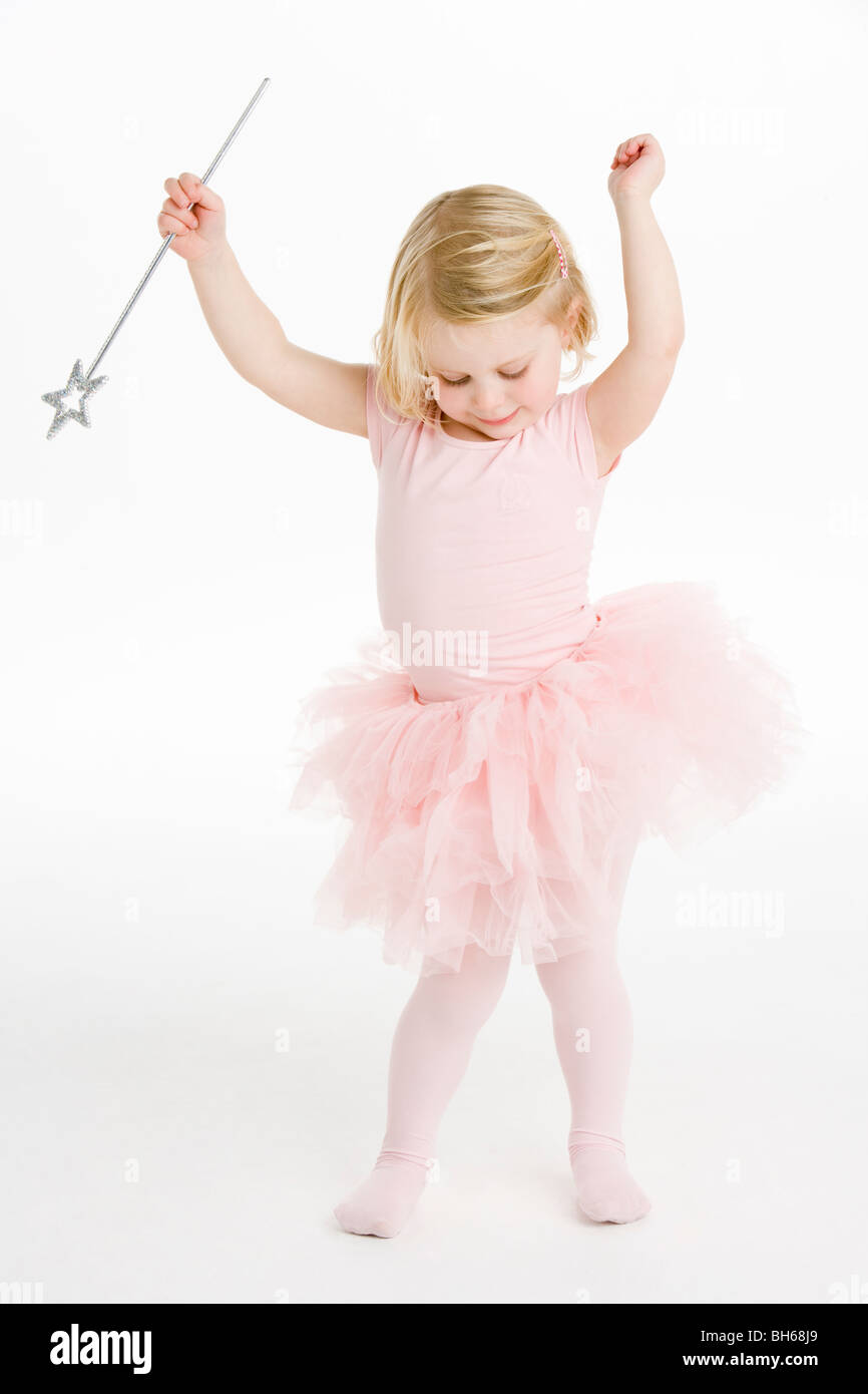 Kleine Ballerina-Holding-Zauberstab Stockfoto