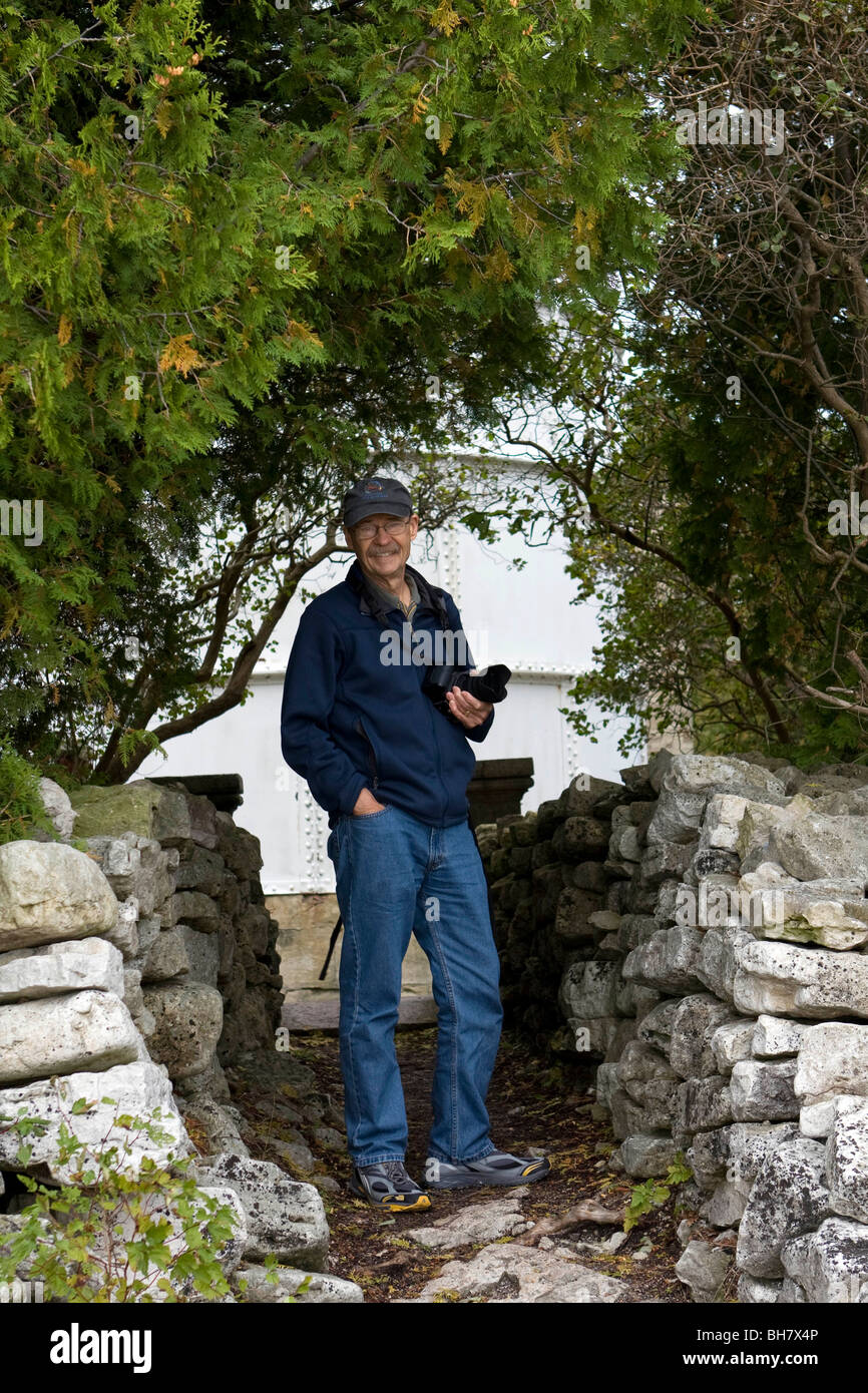 Stu Wilson, Reisejournalist, bei Cana Insel Leuchtturm, Door County, Wisconsin, USA, Nordamerika. Stockfoto