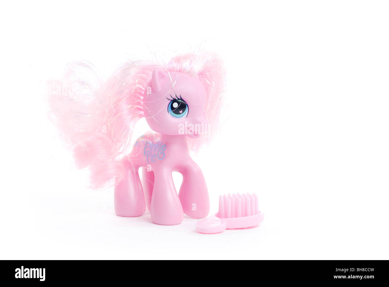 Spielzeug-Pony auf weißem Hintergrund Stockfoto