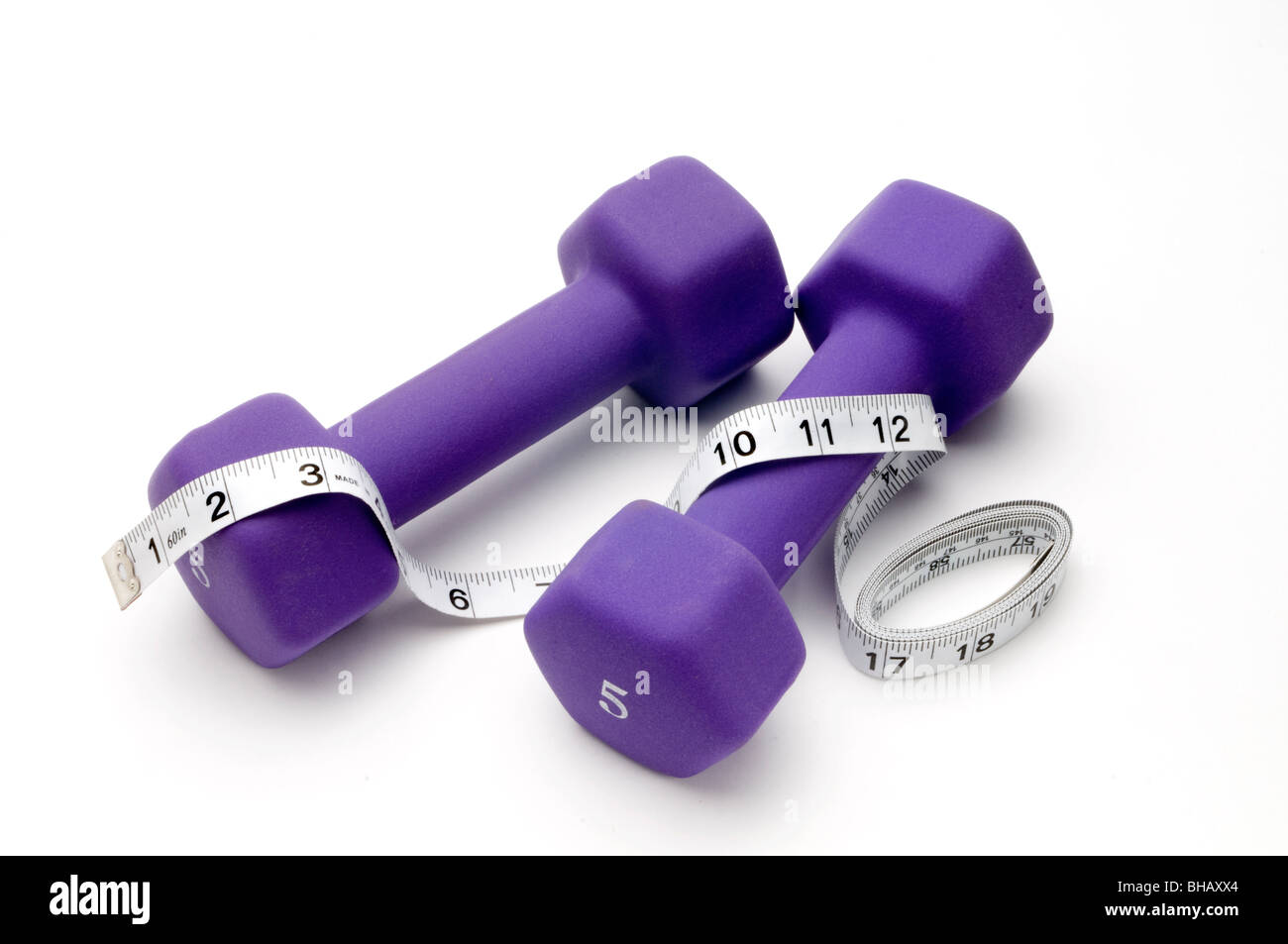 Hanteln und Maßband Stockfoto