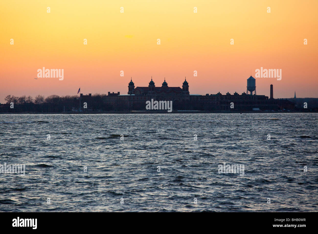 Ellis Island bei Sonnenuntergang Stockfoto