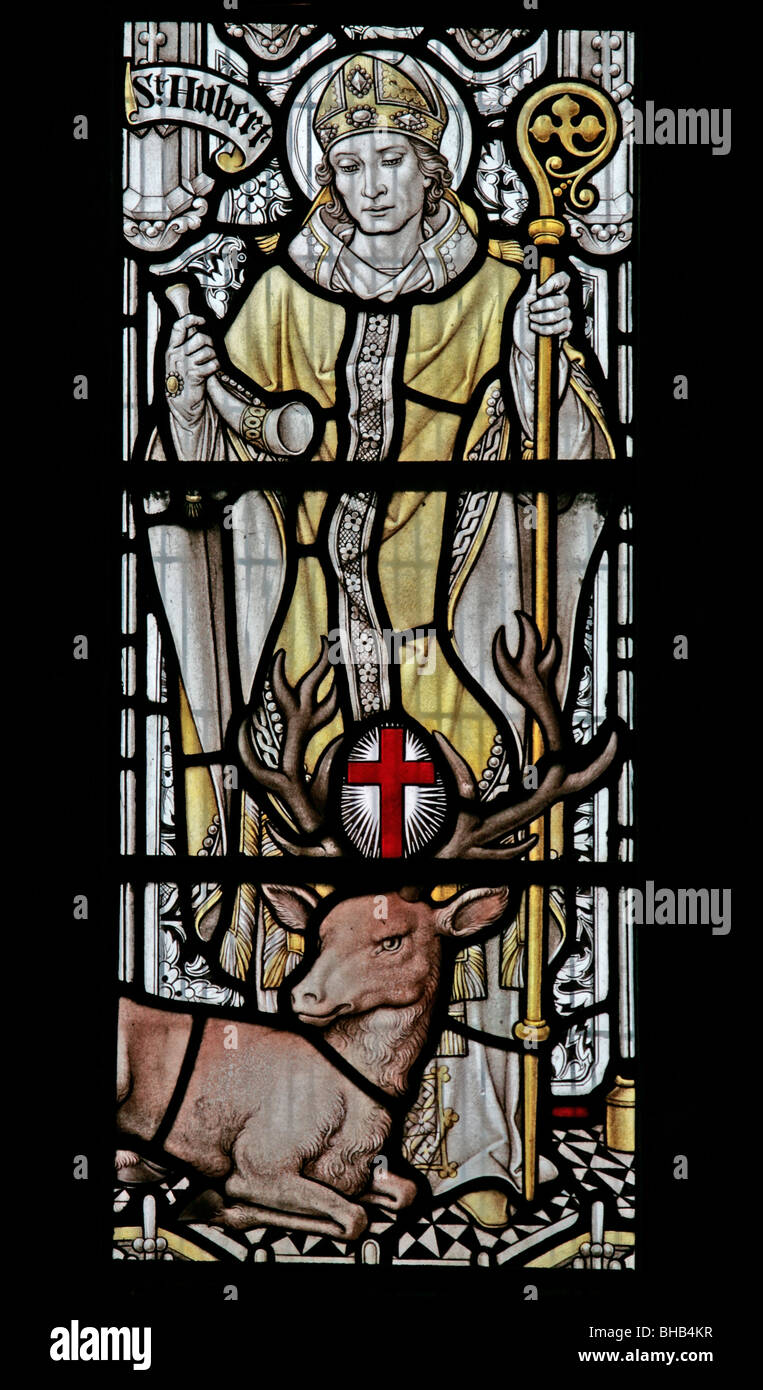 Ein Buntglasfenster von Alfred L. Wilkinson mit Darstellung des Heiligen Hubert, St. Gregory's Minster Church, Kirkdale, North Yorkshire Stockfoto