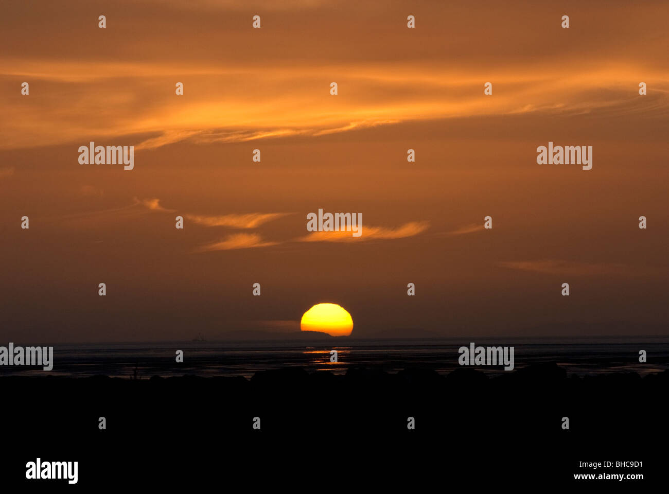 Sonnenuntergang über Hilbre Insel Halbinsel Wirral UK Stockfoto