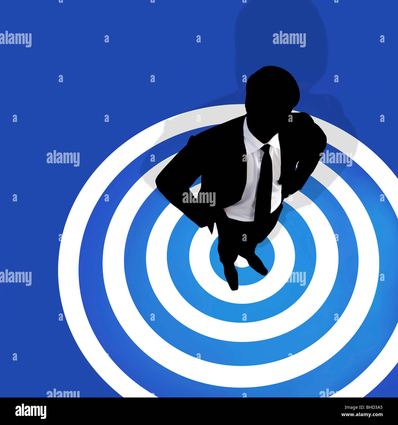 Geschäftsmann, stehend auf einem Bullen-Auge Stockfoto