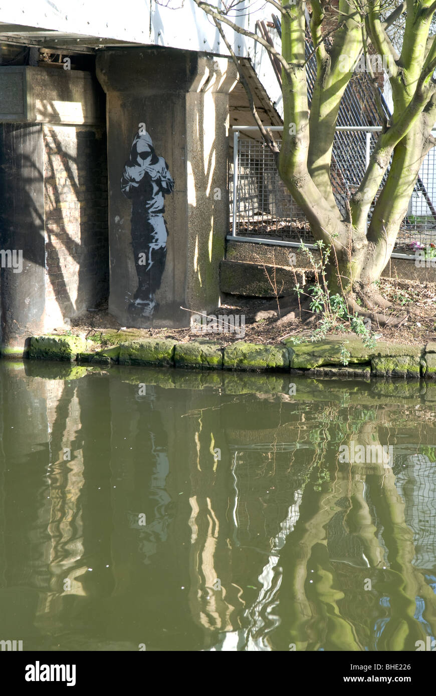 Schablone gemalt am Kanal in Camden Town, London, UK Stockfoto