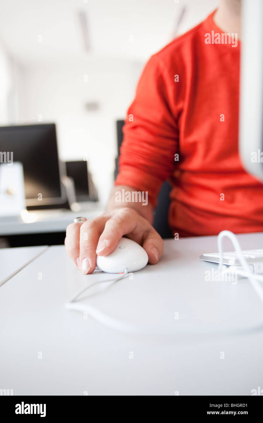Mann mit Computermaus Stockfoto