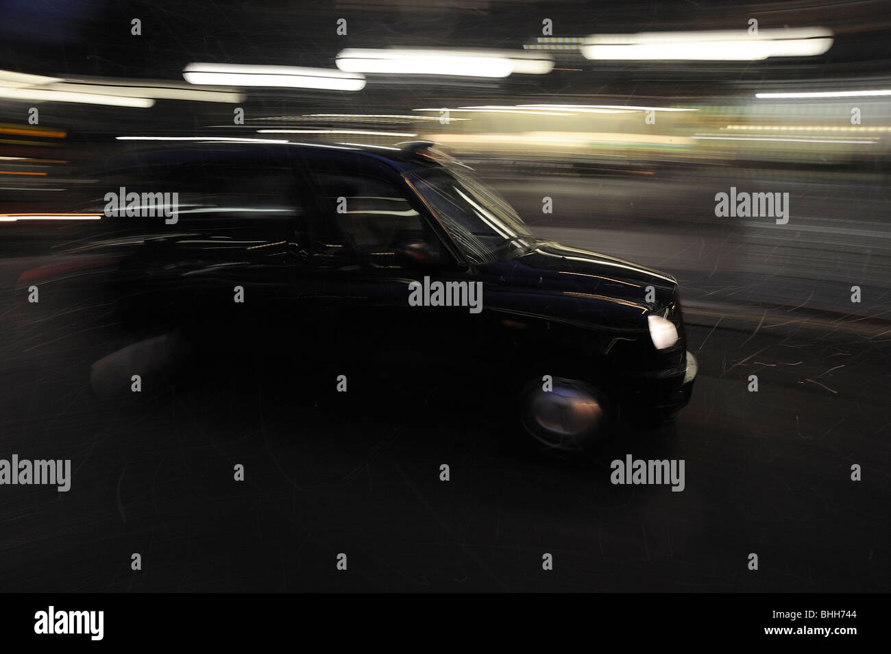 London Taxi Taxi in der Nacht Stockfoto