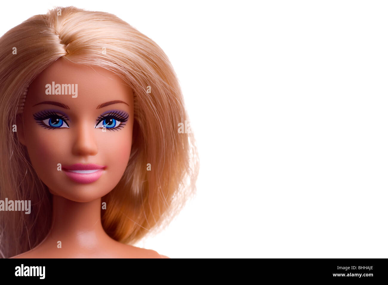 Nahaufnahme von einer Barbie Puppe Gesicht mit blonden Haaren & blaue Augen Stockfoto