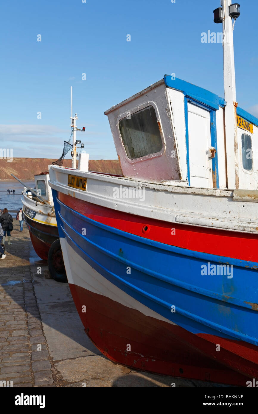 Entgeisterung Angelboote/Fischerboote auf Kabel landen, Filey, North Yorkshire, England, UK Stockfoto
