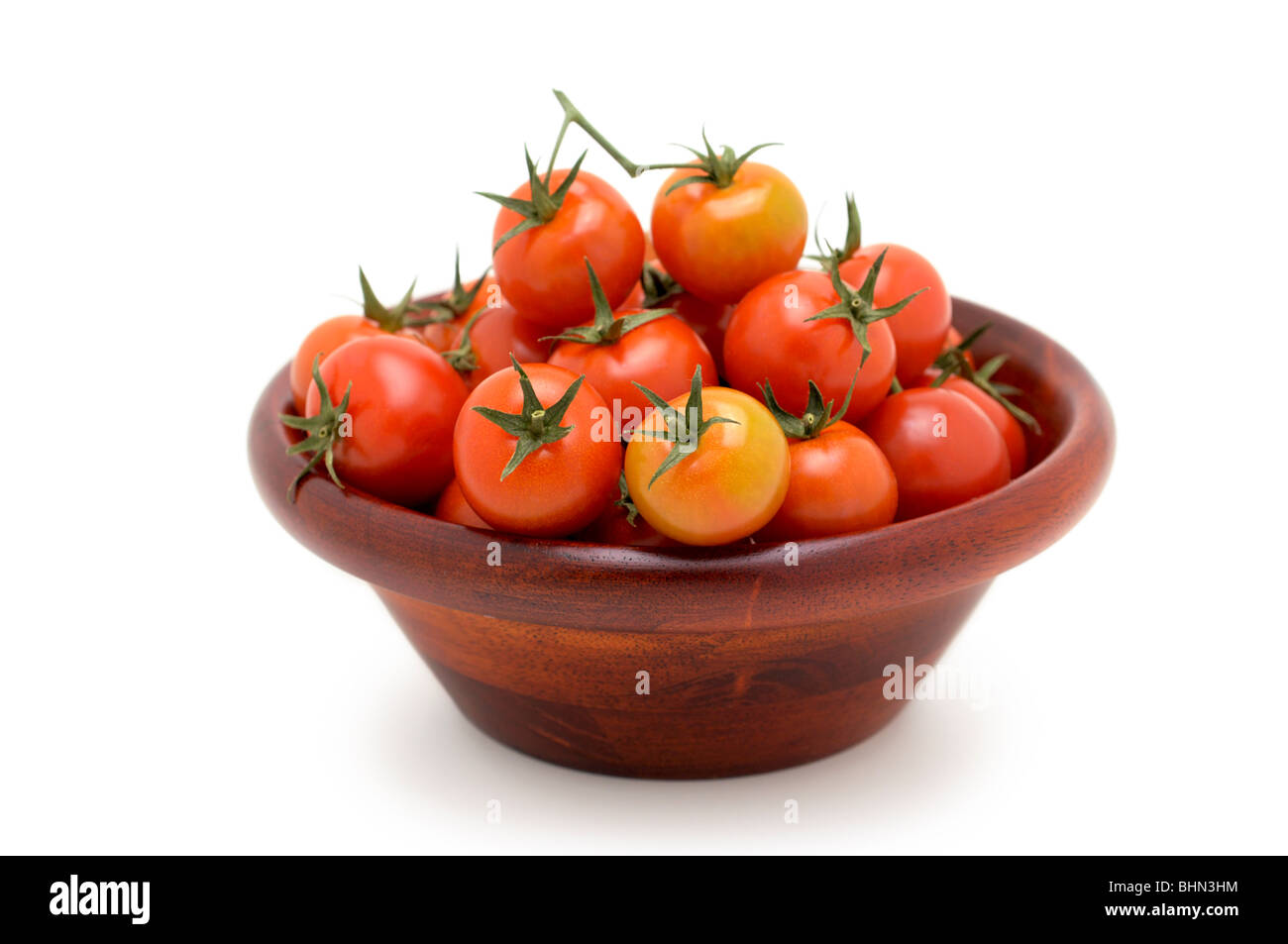 Cherry-Tomaten in Holzschale Stockfoto