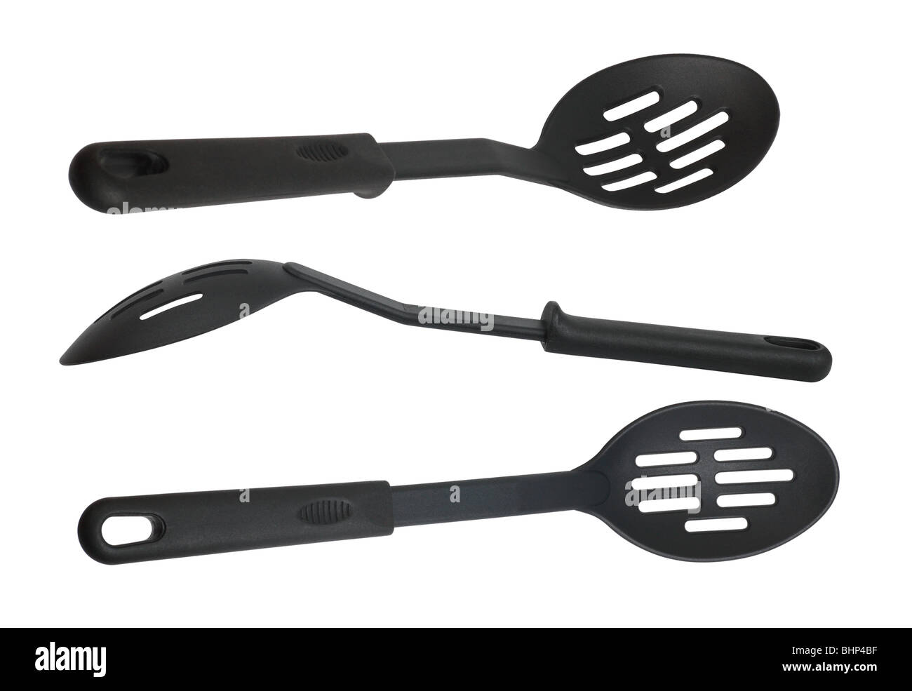 Satz von Utensilien Kochlöffel mit schwarzem Nylon Softgriffen. Weißem Hintergrund Stockfoto
