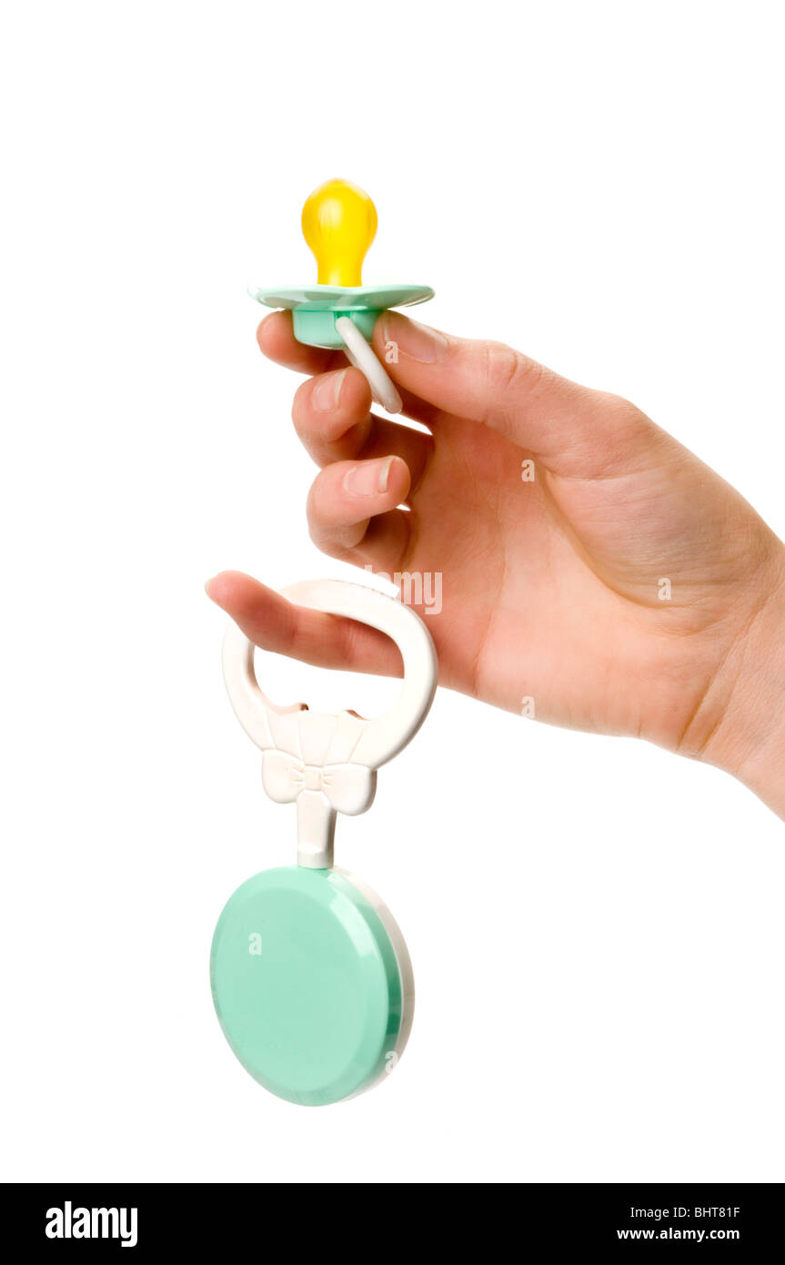 Hand hält Baby Schnuller Stockfoto