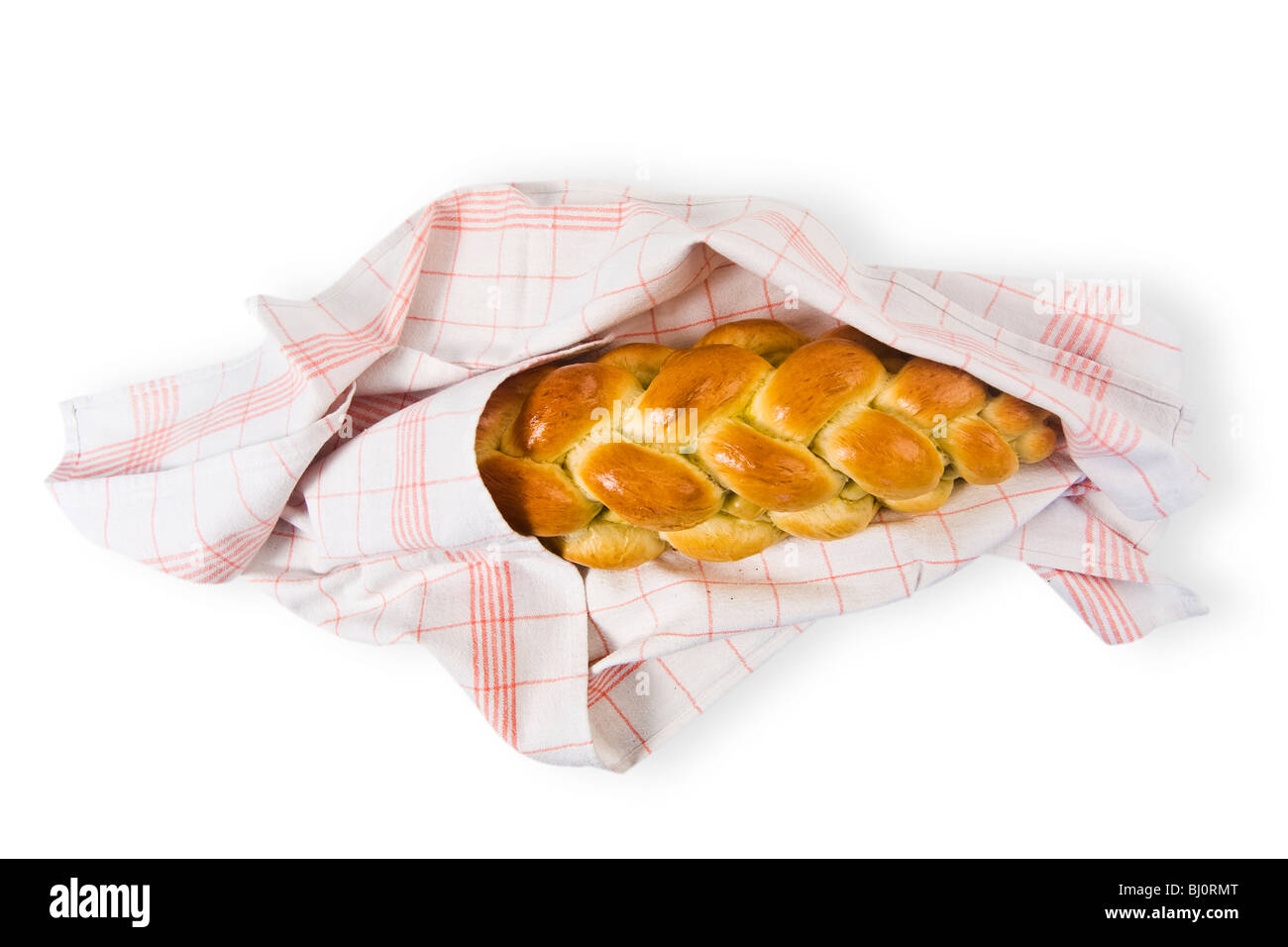 geflochtene Laib in ein Geschirrtuch Stockfoto