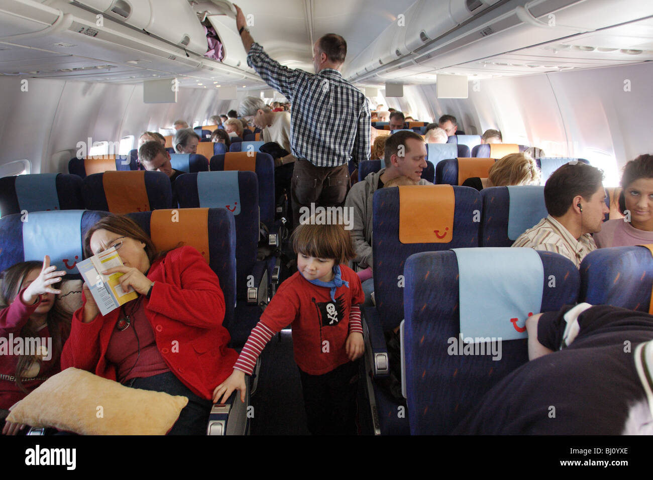 Passagiere im Flugzeug Stockfoto