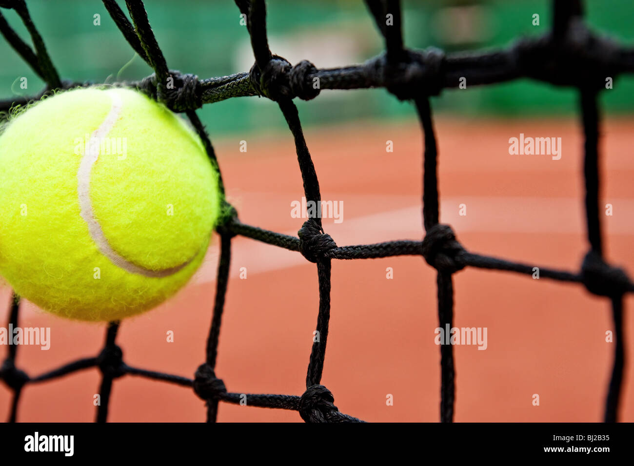 Tennis ball auf den Net-Fail-Konzept Stockfoto
