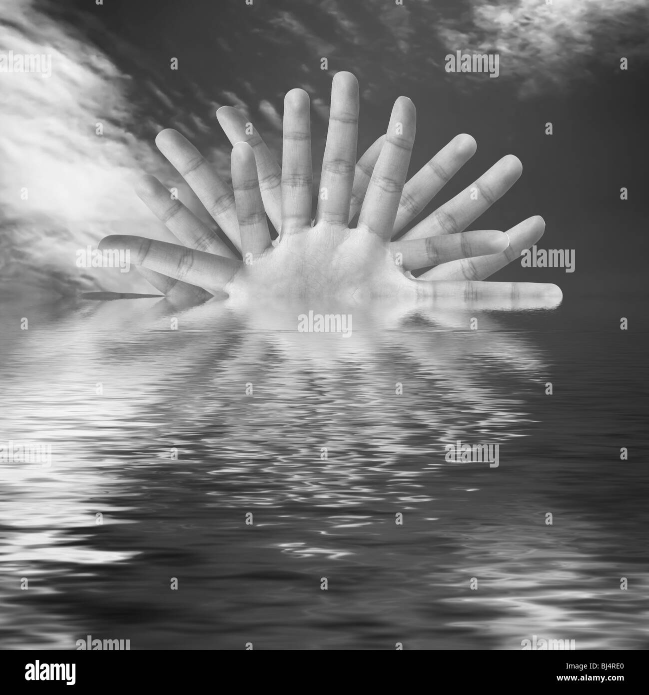 Abstrakter Sonnenaufgang über dem Meer mit der Sonne von Fingern gemacht. Konzeptionelle schwarz-weiß-Foto-illustration Stockfoto