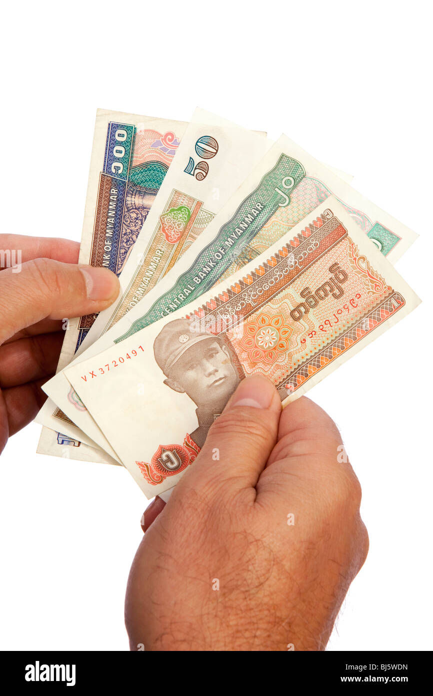 Geld männliche Hand, die Handvoll birmanischen Währung Stockfoto