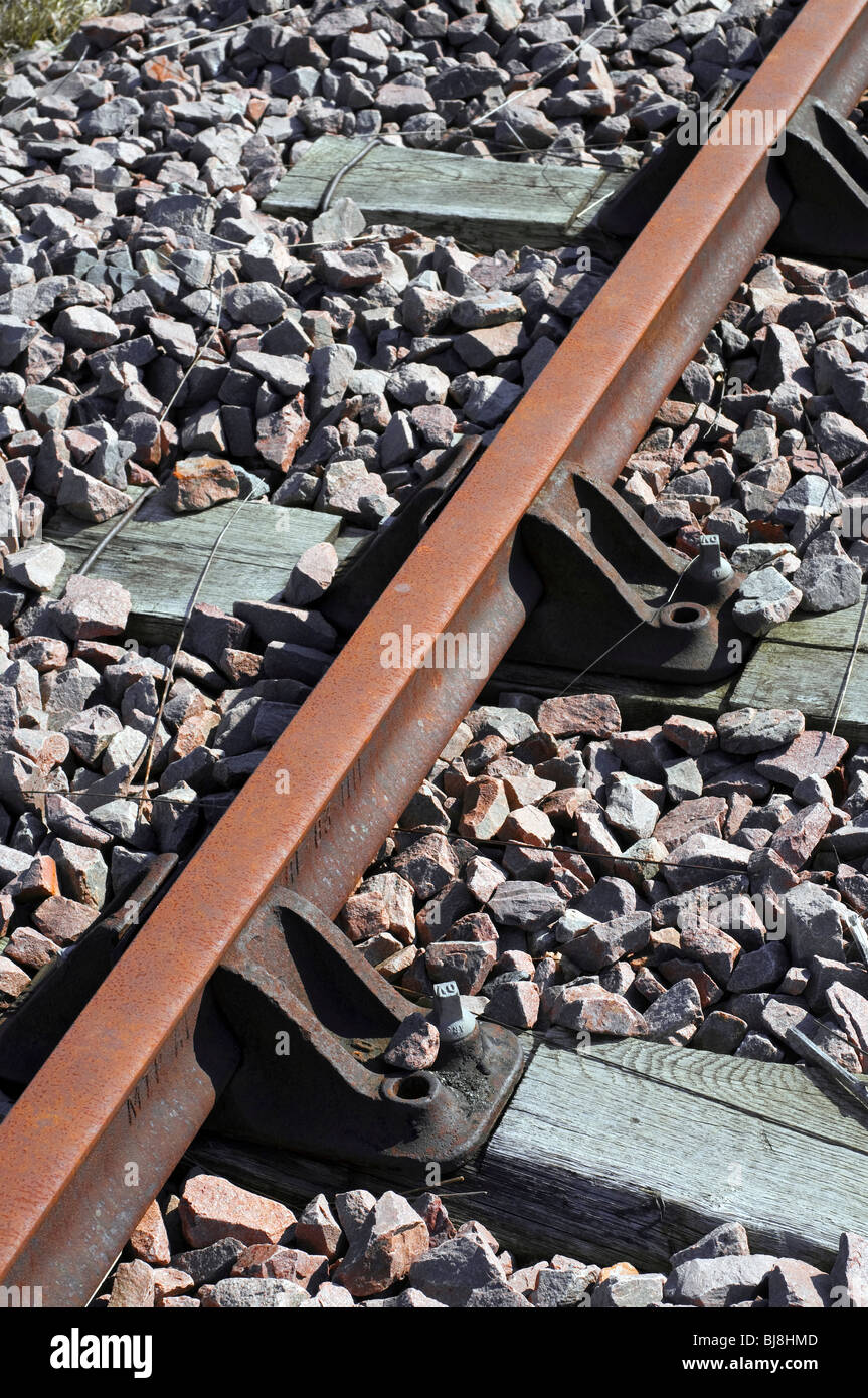 Gleis, Stuhl, Schläfer und Stein mit ballast Detail - Frankreich. Stockfoto
