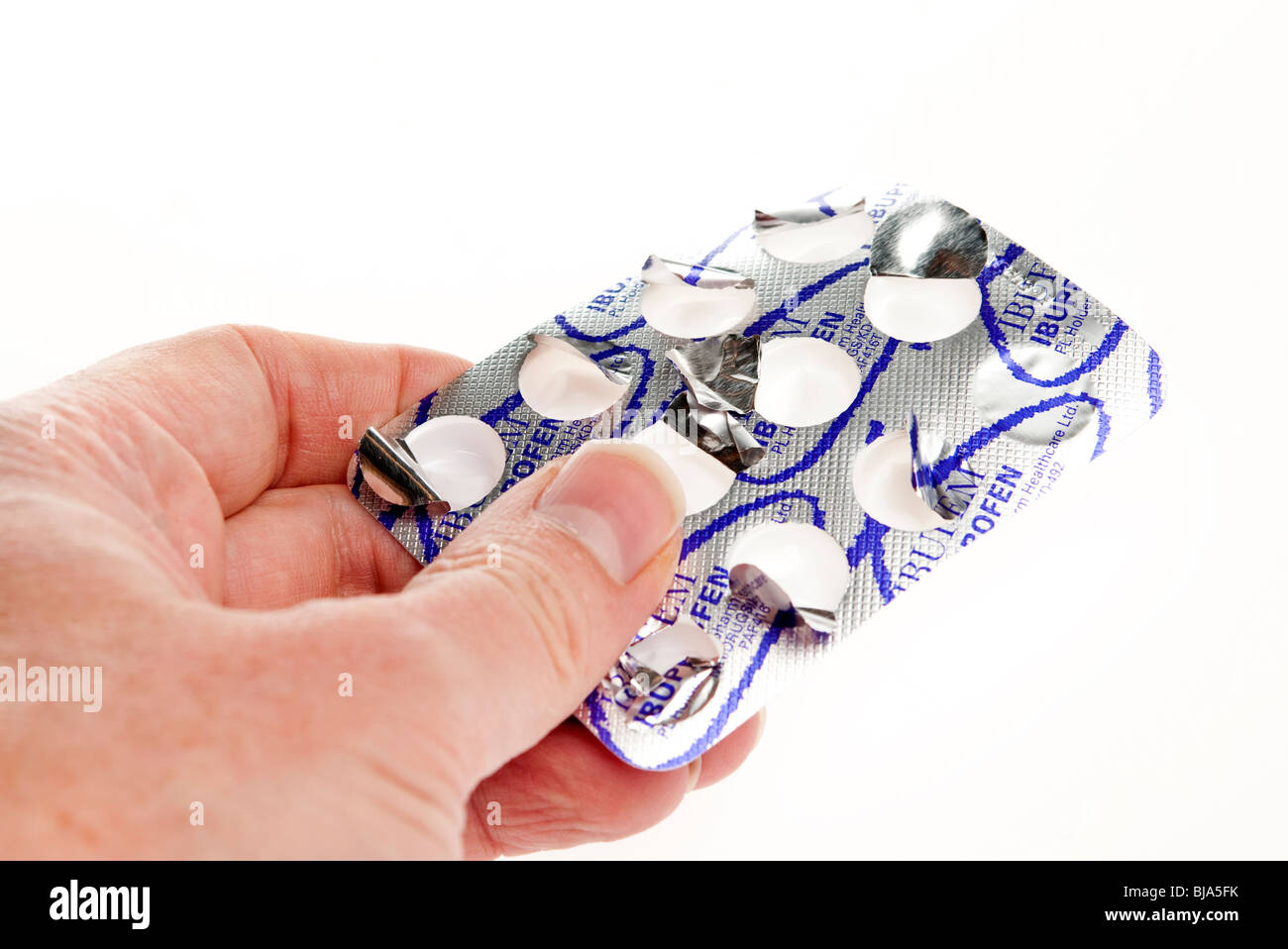 Paket von Kopfschmerzen halten Tabletten Tabletten Stockfoto