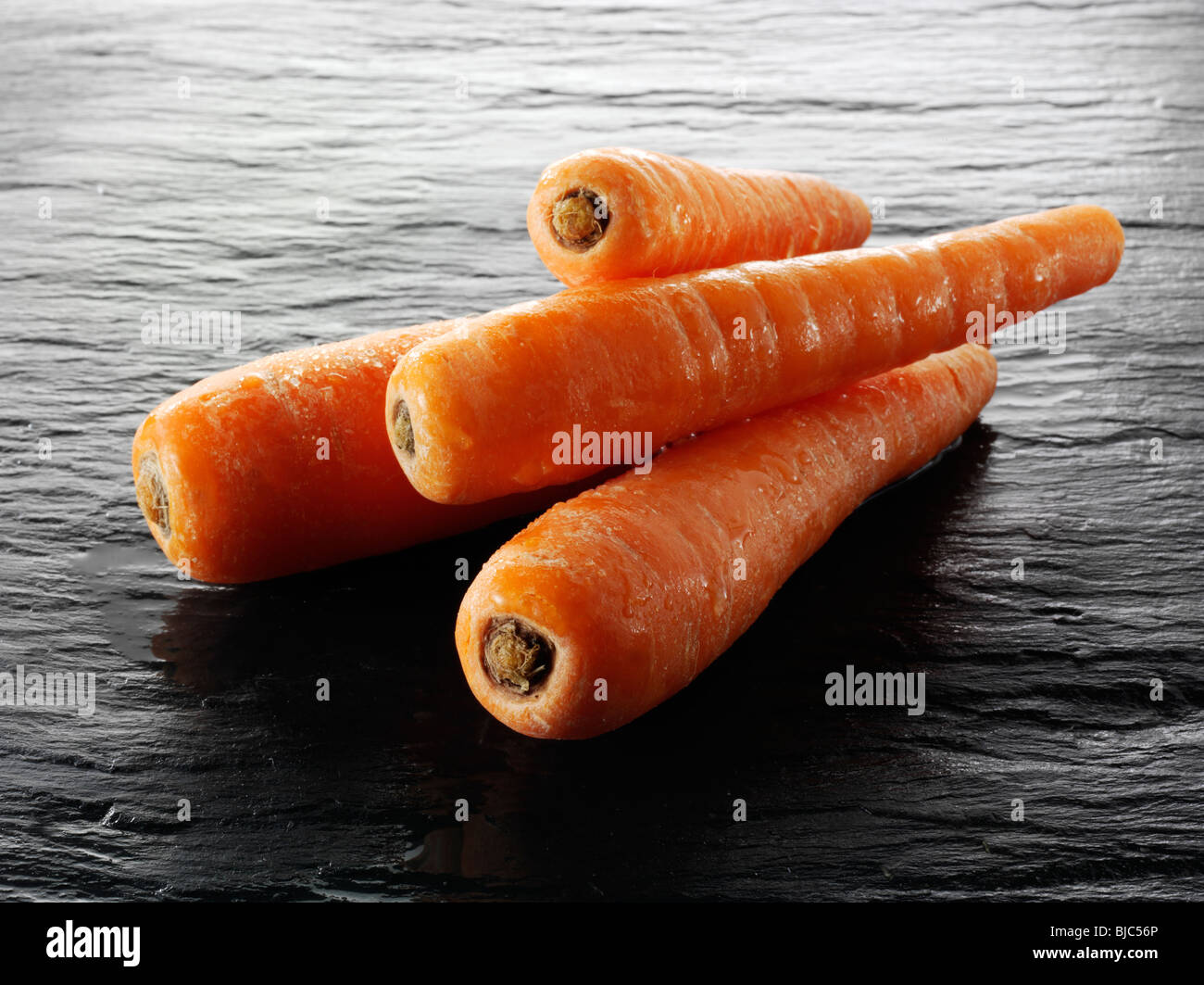Ganz un-gekochte Carotts Stockfotos Stockfoto
