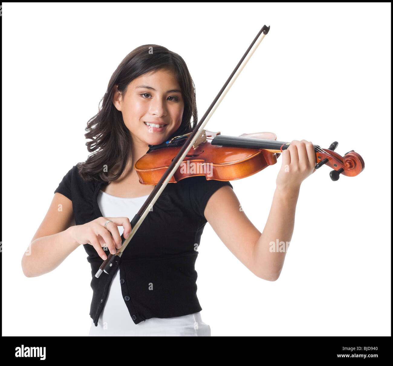Junge Frau mit einer Geige. Stockfoto