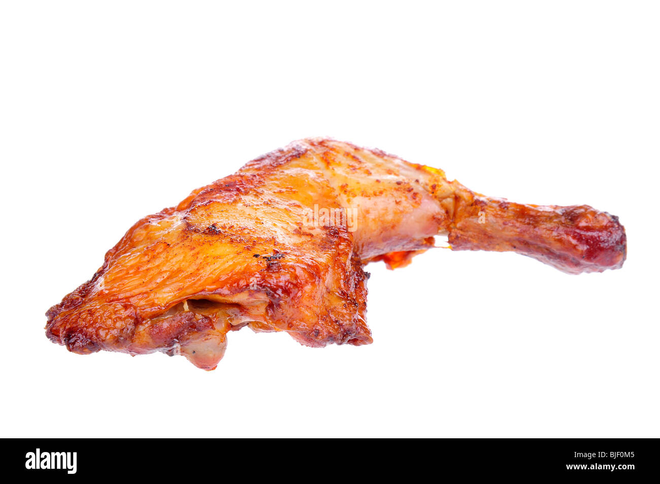 Gebackenes Huhn auf dem weißen Hintergrund isoliert. Stockfoto