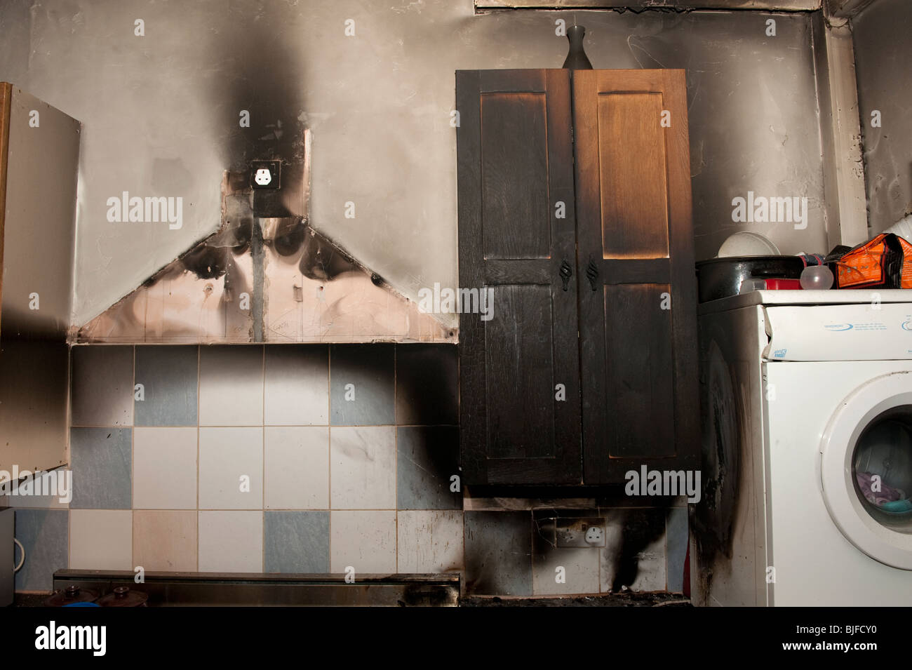 Küche-Feuer-Schaden von Chip Pfanne Feuer Stockfoto