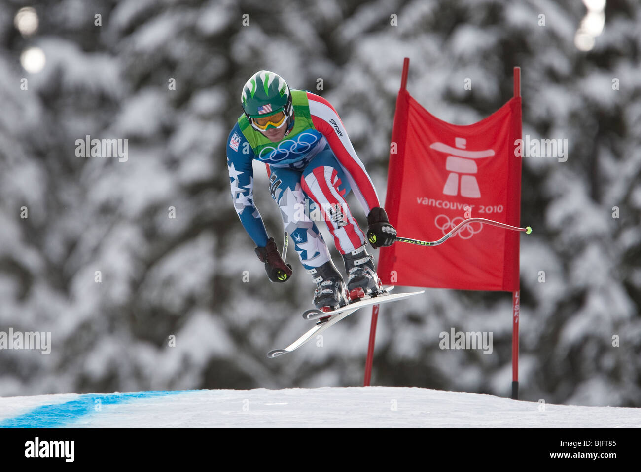 Bode Miller (USA) im Wettbewerb in der Alpine Ski Herren Abfahrt bei den Olympischen Winterspielen 2010 Stockfoto